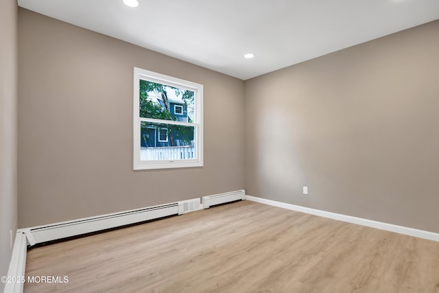 30 Stuyvesant Rd, Brick, NJ 08723 - spare room featuring wood finished floors, recessed lighting, and a baseboard heating unit