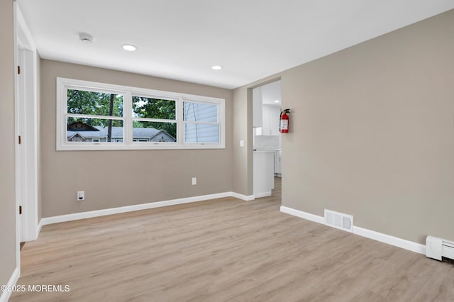 30 Stuyvesant Rd, Brick, NJ 08723 - unfurnished room featuring light wood-style floors, a baseboard heating unit, a smoke detector, and recessed lighting