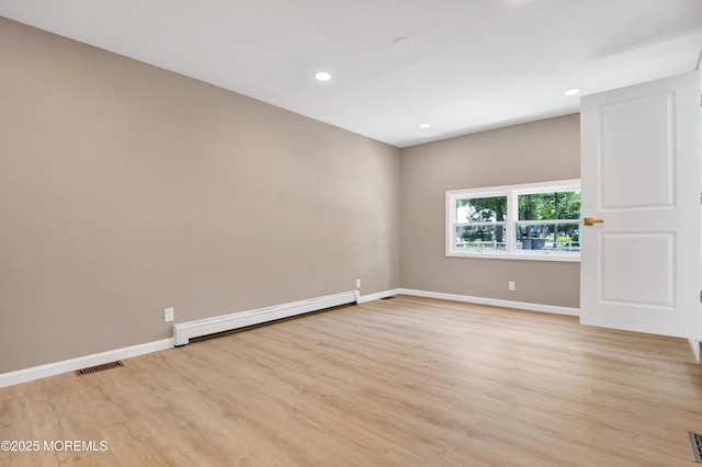 30 Stuyvesant Rd, Brick, NJ 08723 - spare room with baseboard heating, light wood-style flooring, and recessed lighting