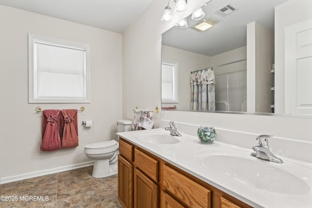 21 Seabreeze Rd, Toms River, NJ 08753 - bathroom featuring double vanity, a shower with shower curtain, and stone finish floors