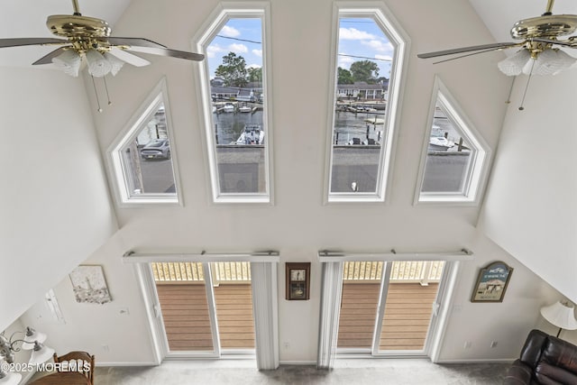 21 Seabreeze Rd, Toms River, NJ 08753 - living area featuring a ceiling fan, a high ceiling, and plenty of natural light