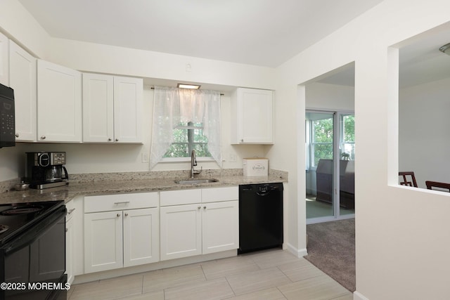 100 Courtshire Dr, Brick, NJ 08723 - kitchen with black appliances, white cabinets, and light stone counters