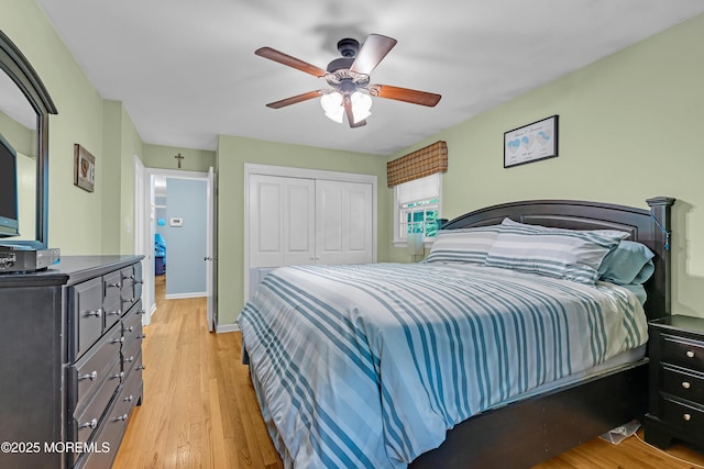 384 Gerry Rd, North Brunswick, NJ 08902 - bedroom featuring a closet, light wood-style flooring, and a ceiling fan
