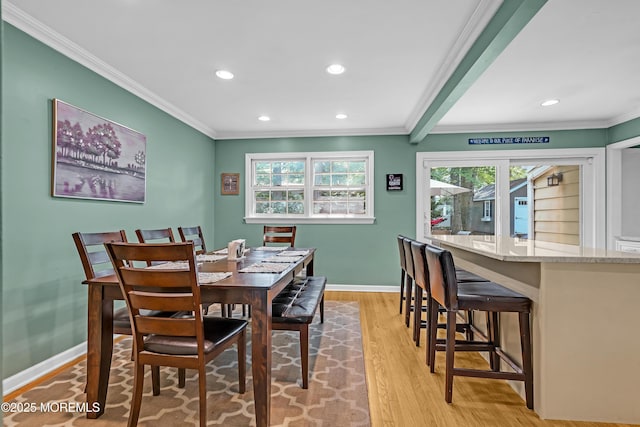 384 Gerry Rd, North Brunswick, NJ 08902 - dining area with ornamental molding, plenty of natural light, light wood finished floors, and recessed lighting