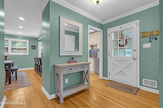 384 Gerry Rd, North Brunswick, NJ 08902 - foyer featuring crown molding, light wood-style floors, and recessed lighting