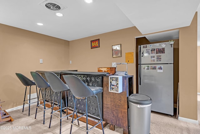 384 Gerry Rd, North Brunswick, NJ 08902 - kitchen featuring freestanding refrigerator, carpet flooring, and recessed lighting