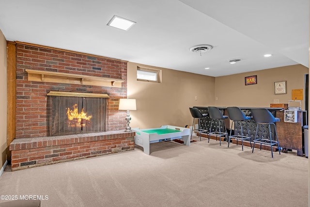 384 Gerry Rd, North Brunswick, NJ 08902 - game room featuring carpet flooring, a brick fireplace, and recessed lighting