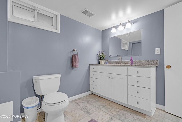 384 Gerry Rd, North Brunswick, NJ 08902 - bathroom featuring vanity and marble finish floors
