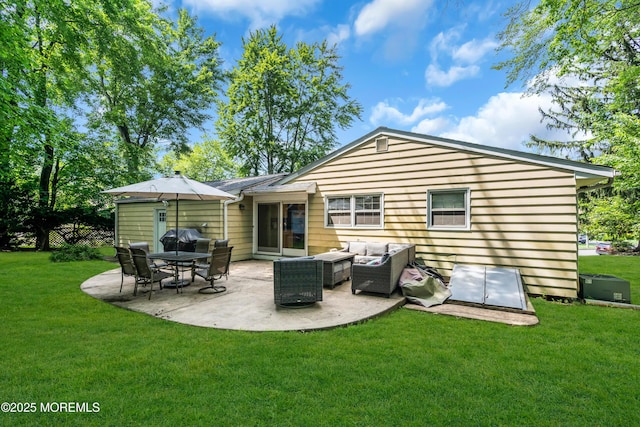 384 Gerry Rd, North Brunswick, NJ 08902 - back of house with a patio, a yard, and an outdoor living space