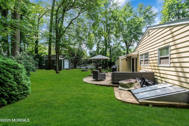 384 Gerry Rd, North Brunswick, NJ 08902 - view of grassy yard with a storage unit, an outdoor hangout area, and a patio area