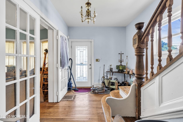 300 Atkins Ave, Neptune Township, NJ 07753 - foyer with wood-type flooring and a chandelier