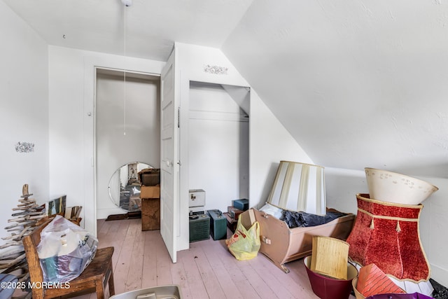 300 Atkins Ave, Neptune Township, NJ 07753 - living area featuring wood-type flooring and vaulted ceiling