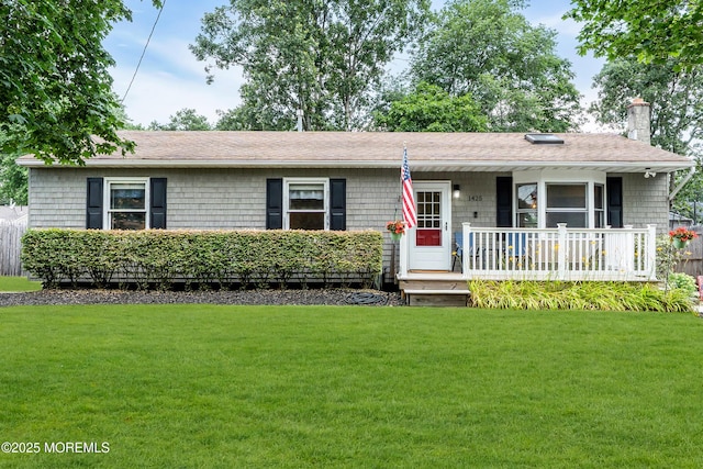 1425 Birmingham Ave, Toms River, NJ 08757 - ranch-style home featuring a front lawn, a chimney, a shingled roof, and a porch