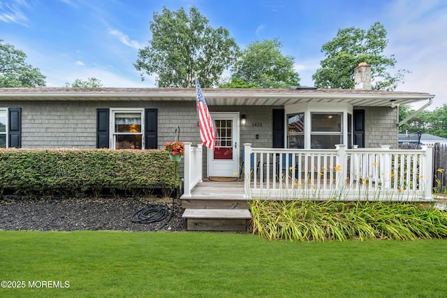 1425 Birmingham Ave, Toms River, NJ 08757 - view of front of house featuring a front yard, a chimney, and a porch