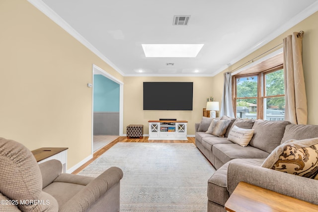 1425 Birmingham Ave, Toms River, NJ 08757 - living area with wood finished floors, a skylight, ornamental molding, and recessed lighting