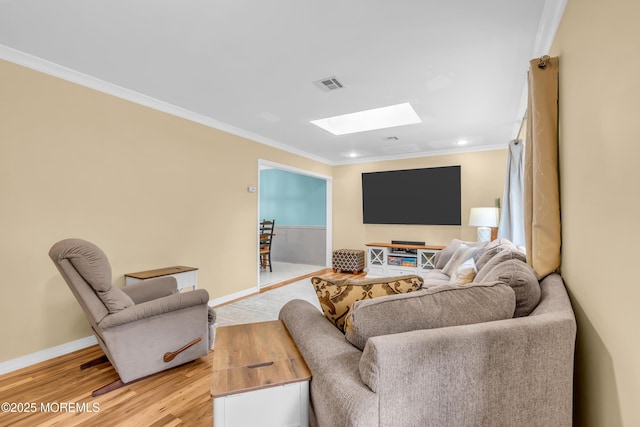 1425 Birmingham Ave, Toms River, NJ 08757 - living room with a skylight, ornamental molding, light wood-style flooring, and recessed lighting