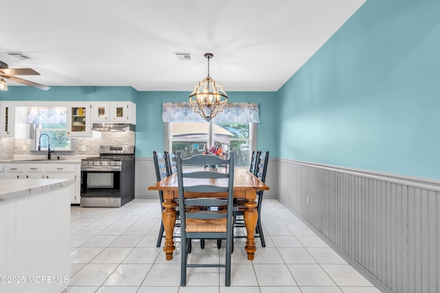 1425 Birmingham Ave, Toms River, NJ 08757 - dining area with healthy amount of natural light, a chandelier, ceiling fan, and light tile patterned floors