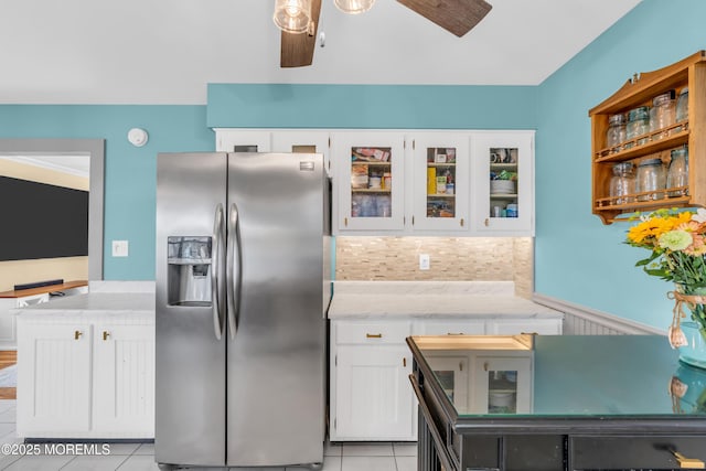 1425 Birmingham Ave, Toms River, NJ 08757 - kitchen featuring stainless steel fridge, ceiling fan, light tile patterned floors, white cabinets, and glass insert cabinets