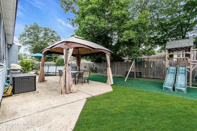 1425 Birmingham Ave, Toms River, NJ 08757 - fenced backyard featuring a gazebo, a playground, and a patio