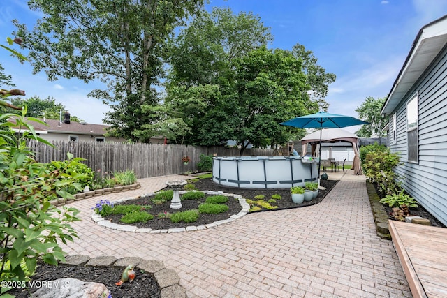 1425 Birmingham Ave, Toms River, NJ 08757 - fenced backyard with a gazebo and a patio area