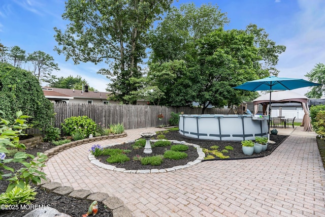 1425 Birmingham Ave, Toms River, NJ 08757 - fenced backyard featuring a gazebo and a patio