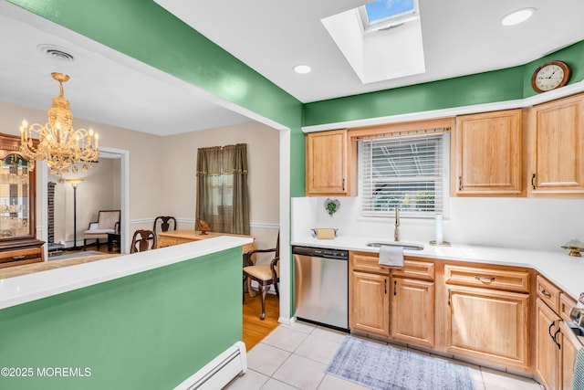 106 Northumberland Dr, Toms River, NJ 08757 - kitchen with dishwasher, light countertops, a chandelier, pendant lighting, and a skylight