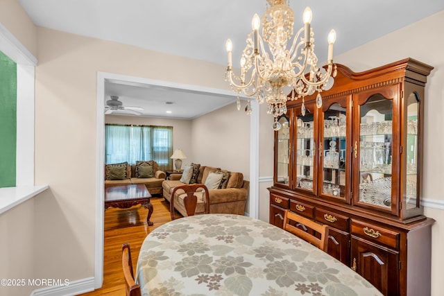 106 Northumberland Dr, Toms River, NJ 08757 - dining room featuring wood finished floors, ceiling fan, and a chandelier