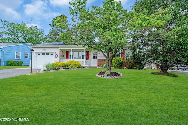 106 Northumberland Dr, Toms River, NJ 08757 - view of front of property with driveway, an attached garage, a front yard, roof mounted solar panels, and covered porch