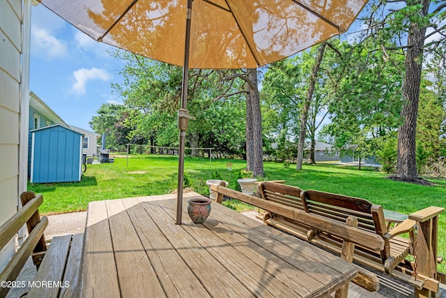 106 Northumberland Dr, Toms River, NJ 08757 - wooden terrace featuring a yard and a storage unit