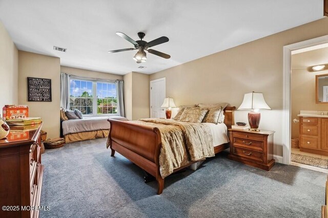 9 Wide Horizons Dr, Colts Neck, NJ 07722 - bedroom featuring dark carpet, ensuite bath, and a ceiling fan