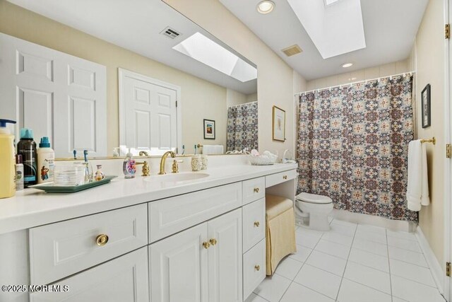 9 Wide Horizons Dr, Colts Neck, NJ 07722 - bathroom with a skylight, tile patterned flooring, vanity, a shower with shower curtain, and recessed lighting