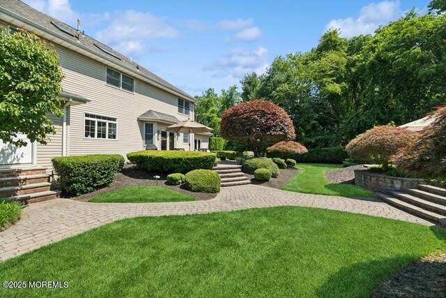 9 Wide Horizons Dr, Colts Neck, NJ 07722 - view of green lawn with entry steps
