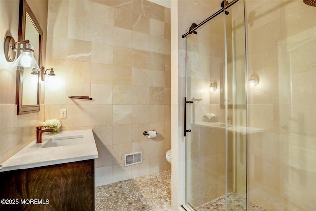 7 Rancho Polo, Colts Neck, NJ 07722 - bathroom with tile walls, vanity, and a shower stall