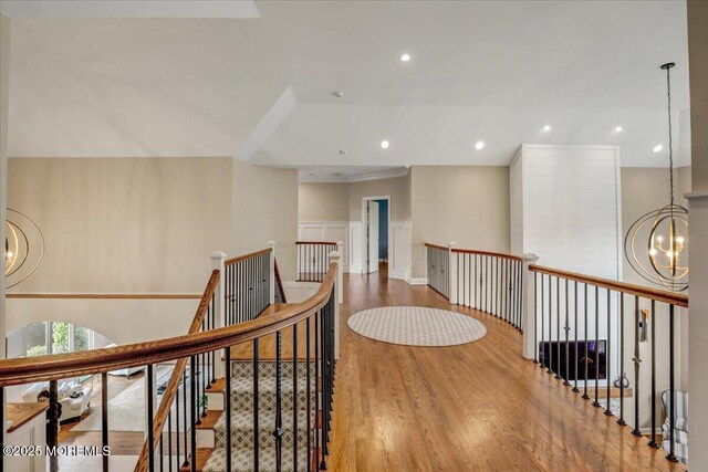 7 Rancho Polo, Colts Neck, NJ 07722 - hallway featuring a chandelier, wood finished floors, an upstairs landing, and recessed lighting