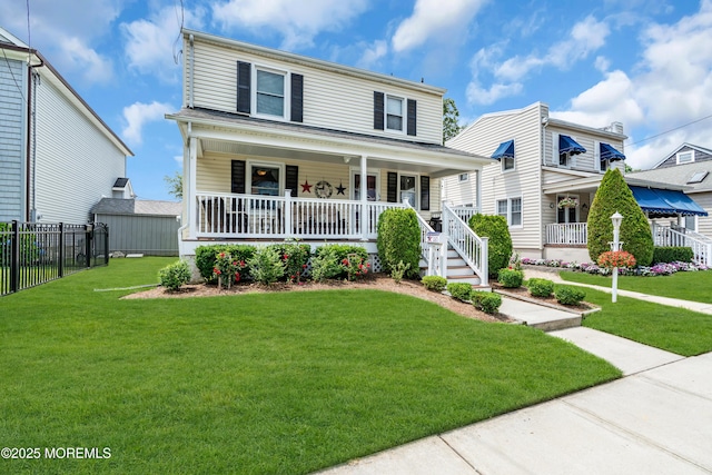 502 Corlies Ave, West Allenhurst, NJ 07711 - view of front facade with a porch