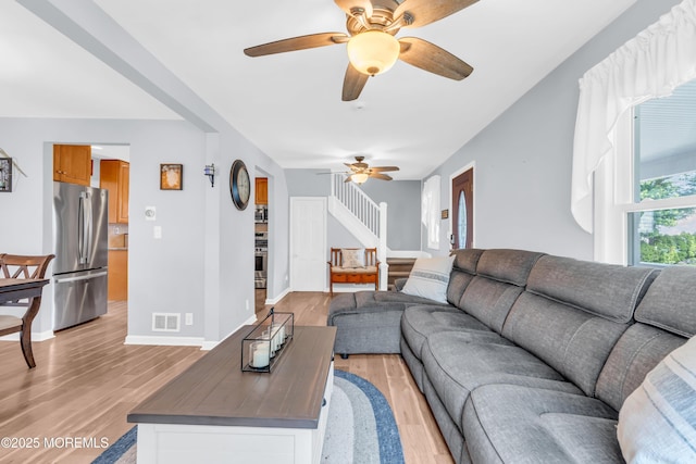 502 Corlies Ave, West Allenhurst, NJ 07711 - living area with a ceiling fan, light wood-style flooring, and stairway
