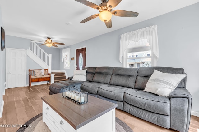 502 Corlies Ave, West Allenhurst, NJ 07711 - living area featuring ceiling fan, light wood-style floors, and stairway