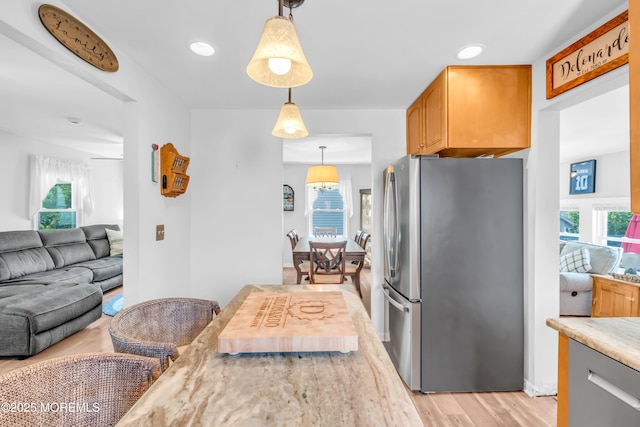 502 Corlies Ave, West Allenhurst, NJ 07711 - kitchen with freestanding refrigerator, open floor plan, light wood-style floors, light countertops, and recessed lighting