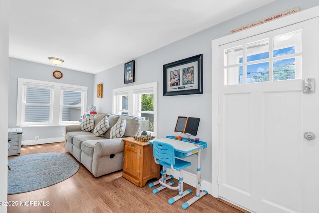 502 Corlies Ave, West Allenhurst, NJ 07711 - living room featuring light wood-style floors and baseboards