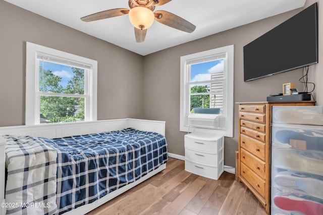 502 Corlies Ave, West Allenhurst, NJ 07711 - bedroom featuring multiple windows, wood finished floors, and a ceiling fan