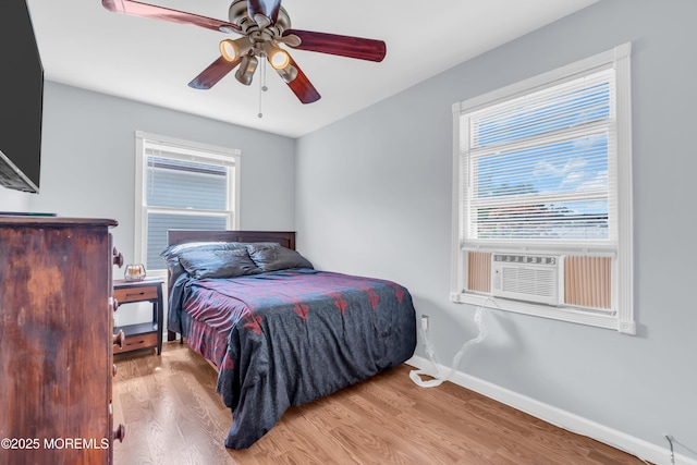 502 Corlies Ave, West Allenhurst, NJ 07711 - bedroom featuring multiple windows, wood finished floors, and ceiling fan