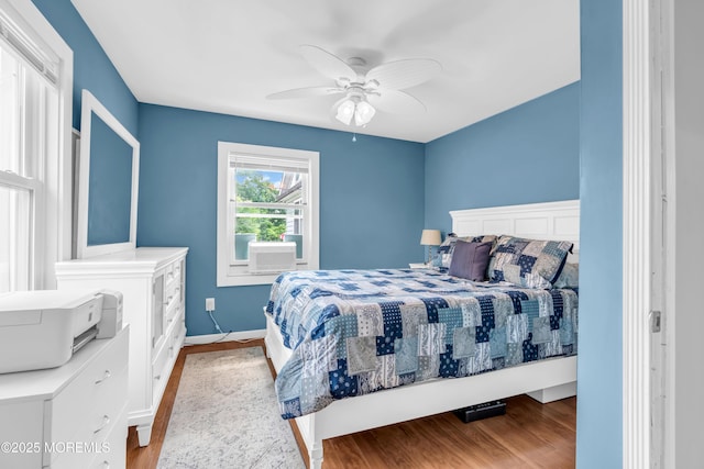 502 Corlies Ave, West Allenhurst, NJ 07711 - bedroom with wood finished floors, ceiling fan, and cooling unit