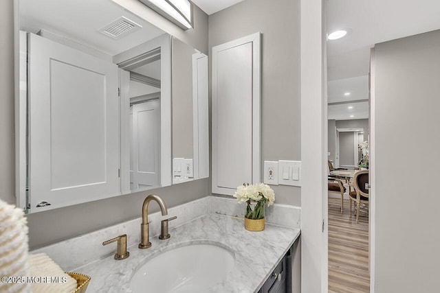 51 Hiering Ave Unit D4, Seaside Heights, NJ 08751 - bathroom with vanity, wood finished floors, and recessed lighting