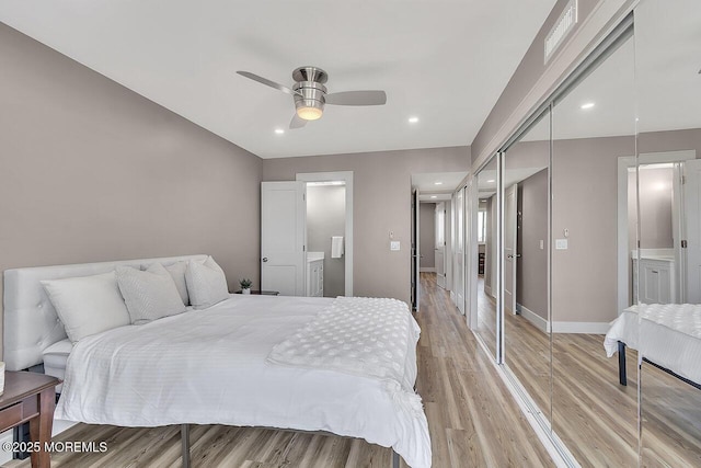 51 Hiering Ave Unit D4, Seaside Heights, NJ 08751 - bedroom featuring light wood-type flooring, connected bathroom, a closet, recessed lighting, and ceiling fan