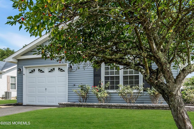 28 Greenbriar Blvd, Brick, NJ 08724 - view of front facade with a garage, a front yard, and driveway