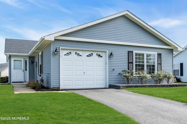 28 Greenbriar Blvd, Brick, NJ 08724 - ranch-style house featuring driveway, an attached garage, a front lawn, and a shingled roof