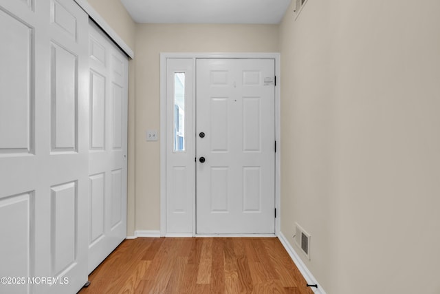 28 Greenbriar Blvd, Brick, NJ 08724 - foyer featuring light wood finished floors and baseboards