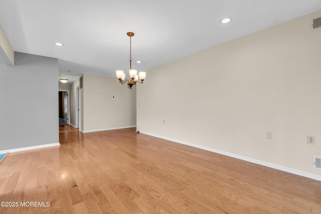 28 Greenbriar Blvd, Brick, NJ 08724 - unfurnished room with a chandelier, light wood-style floors, and recessed lighting