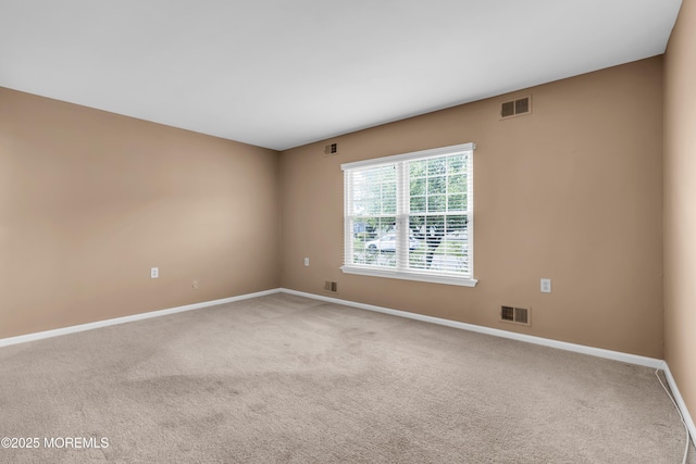 28 Greenbriar Blvd, Brick, NJ 08724 - spare room with baseboards and light carpet