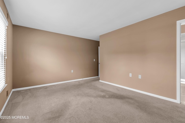 28 Greenbriar Blvd, Brick, NJ 08724 - empty room featuring carpet and baseboards